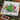 Advent calendar with a christmas tree in the middle and horses around showing lights. 