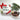 White Happy Holidays box with red flower and red ribbon. Plate in front is an assortment of milk and dark chocolates from our Nautical Collection 